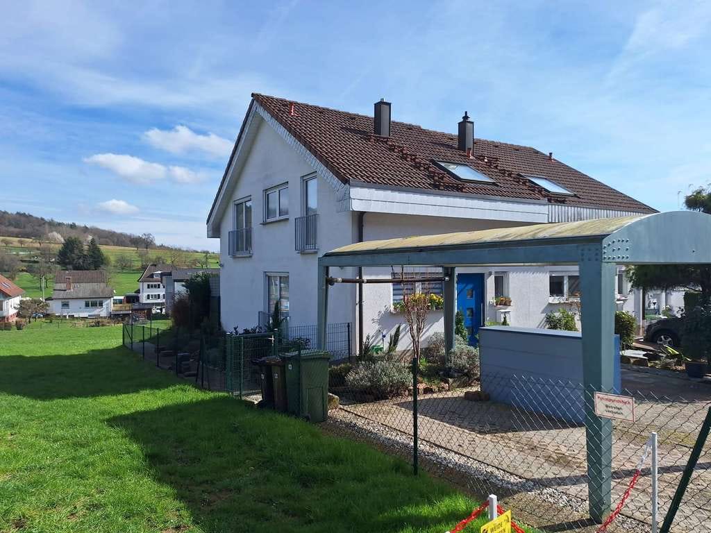 Immobilie in Neckarsteinach - Idyllische Doppelhaushälfte mit unverbaubarem Blick und großzügigem Garten in naturnaher Lage - Bild 0