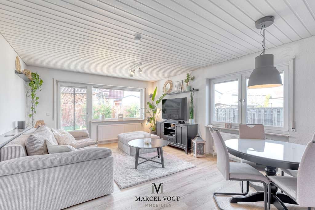Immobilie in Wolfschlugen - Lichtdurchflutete Erdgeschosswohnung mit Garten & Terrasse – Wohnen auf zwei Ebenen - Bild 0