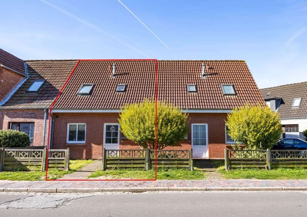 Immobilie in Heide - Solides Reihenmittelhaus in zentraler Lage in Heide - Bild 1