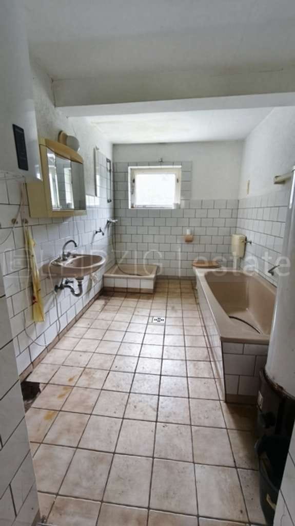 Immobilie in Taucha - Sanierungsbedürftiges Neubauernhaus mit großem Ausbaupotenzial - Bild 1
