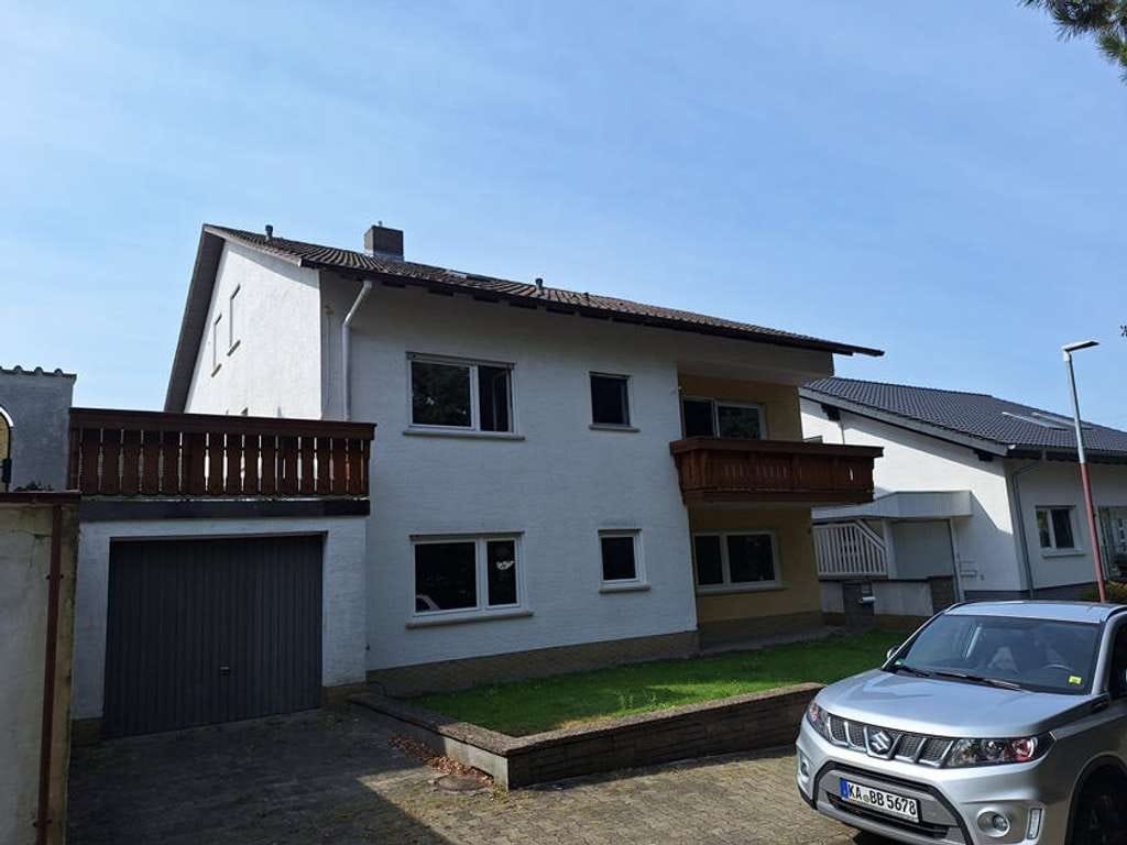 Immobilie in Philippsburg - Freistehendes Zweifamilienhaus in  Randlage in Philippsburg-Huttenheim! - Bild 0