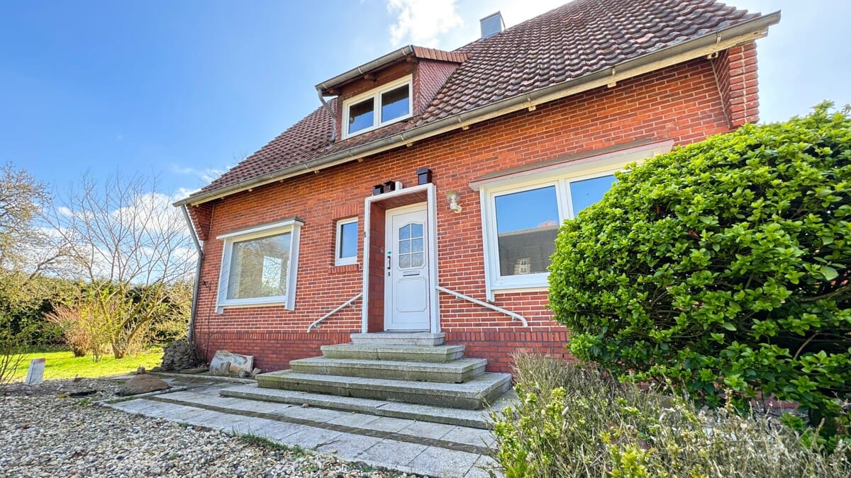 Immobilie in Neuenhaus - Einfamilienhaus mit Einliegerwohnung in Neuenhaus; + Baugrundstück-Potenzial - Bild 0