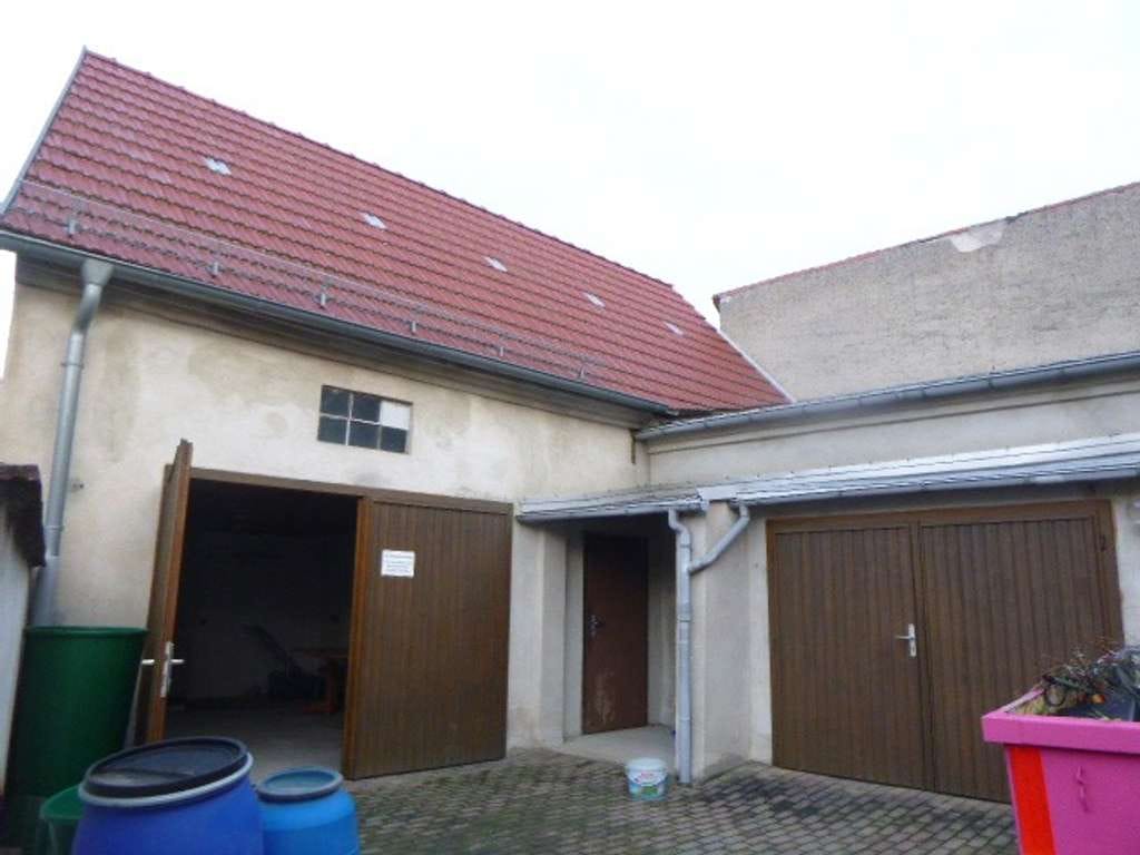 Immobilie in Dommitzsch - Reihenendhaus in ruhiger Stadtlage mit kleinem Garten und Nebengelass in Dommitzsch - Bild 2