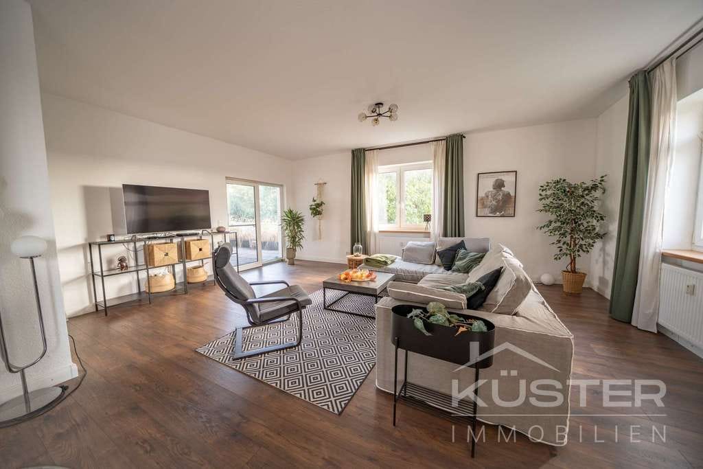 Immobilie in Suthfeld - KÜSTER IMMOBILIEN präsentiert:Exklusives Wohngefühl mit Dachterrasse,Garten und Kamin - Bild 3