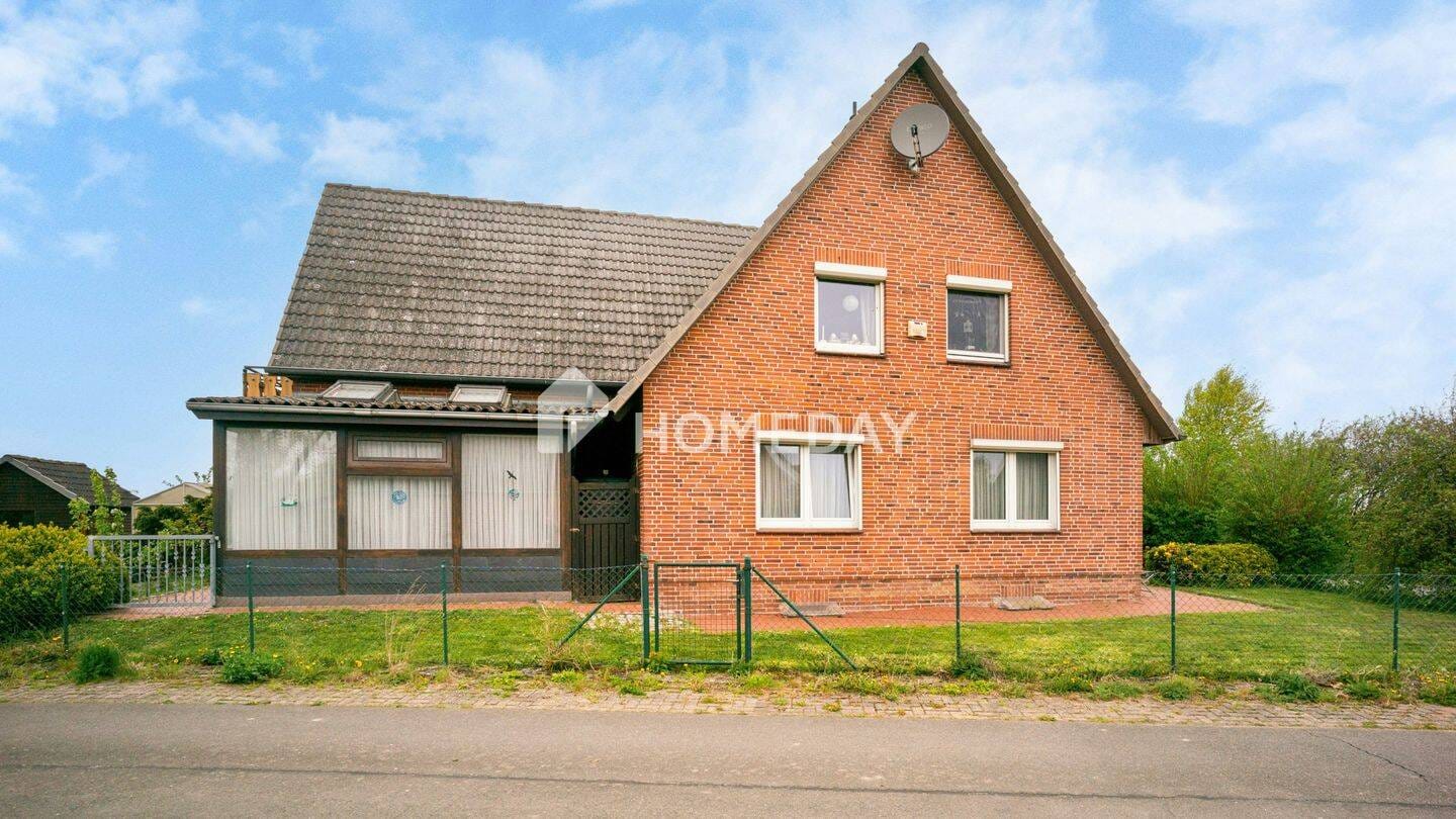 Immobilie in Börgerende-Rethwisch - Zweifamilienhaus mit ca. 300 m² Wohnfläche, Gartenidylle und vielseitigen Nutzungsmöglichkeiten - Bild 2