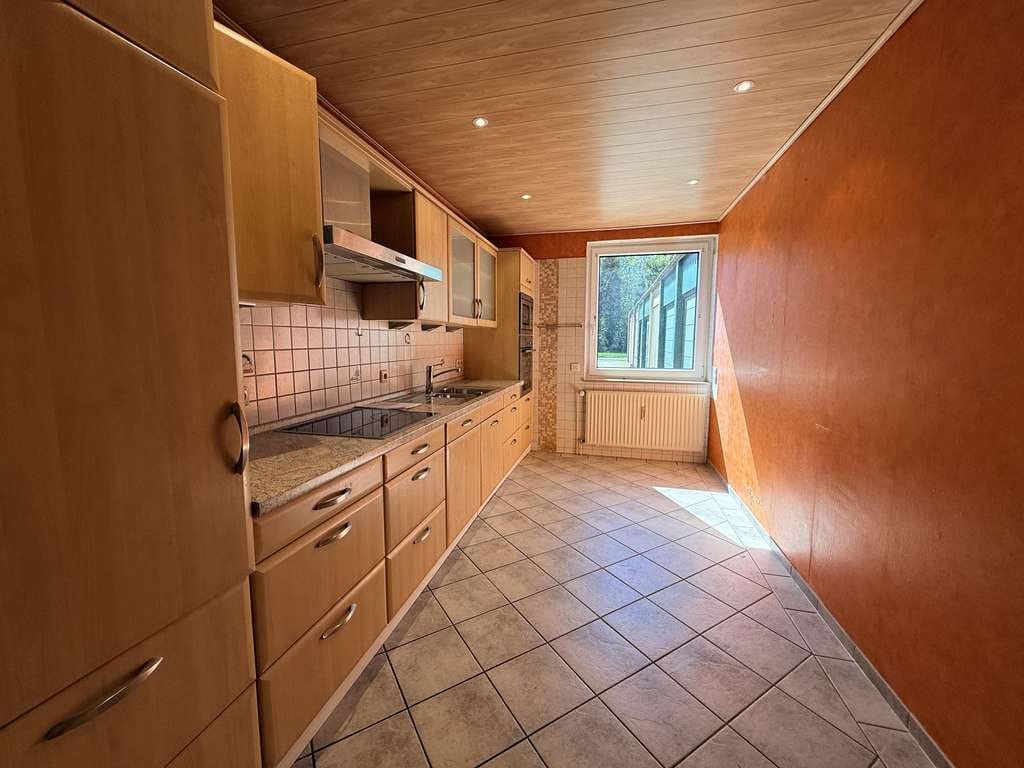 Immobilie in Westerstede - Bezugsfreie Erdgeschosswohnung in Linswege mit 4 Garagen - Bild 4