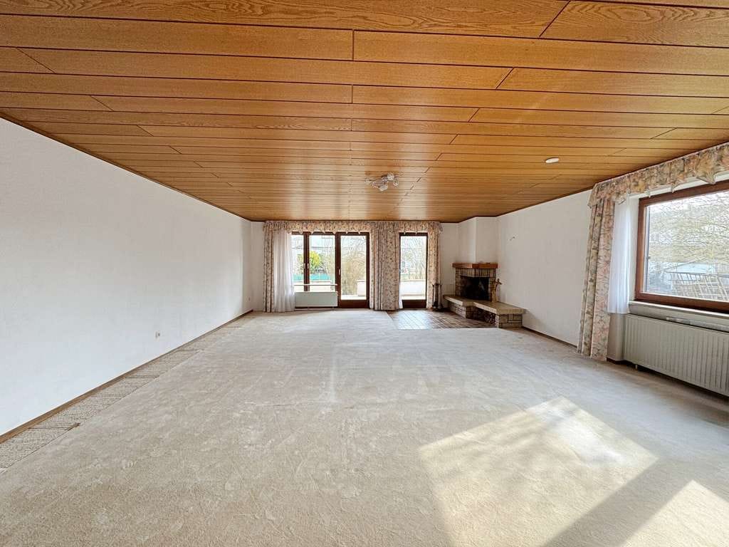 Immobilie in Emmerting - Wohnung kaufen - wie in einem Haus leben - Erdgeschoss mit sonniger Südostterrasse und großem Garten - Bild 0