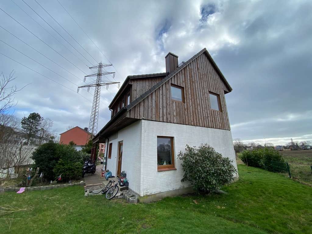 Immobilie in Elmshorn - EFH mit Einliegerwohnung - Top Lage - Raumwunder mit Blick ins Grüne - Bild 2