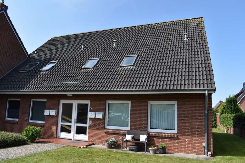 Immobilie in Bredstedt - Zentral gelegene DG-Eigentumswohnung mit Balkon - Bild 1