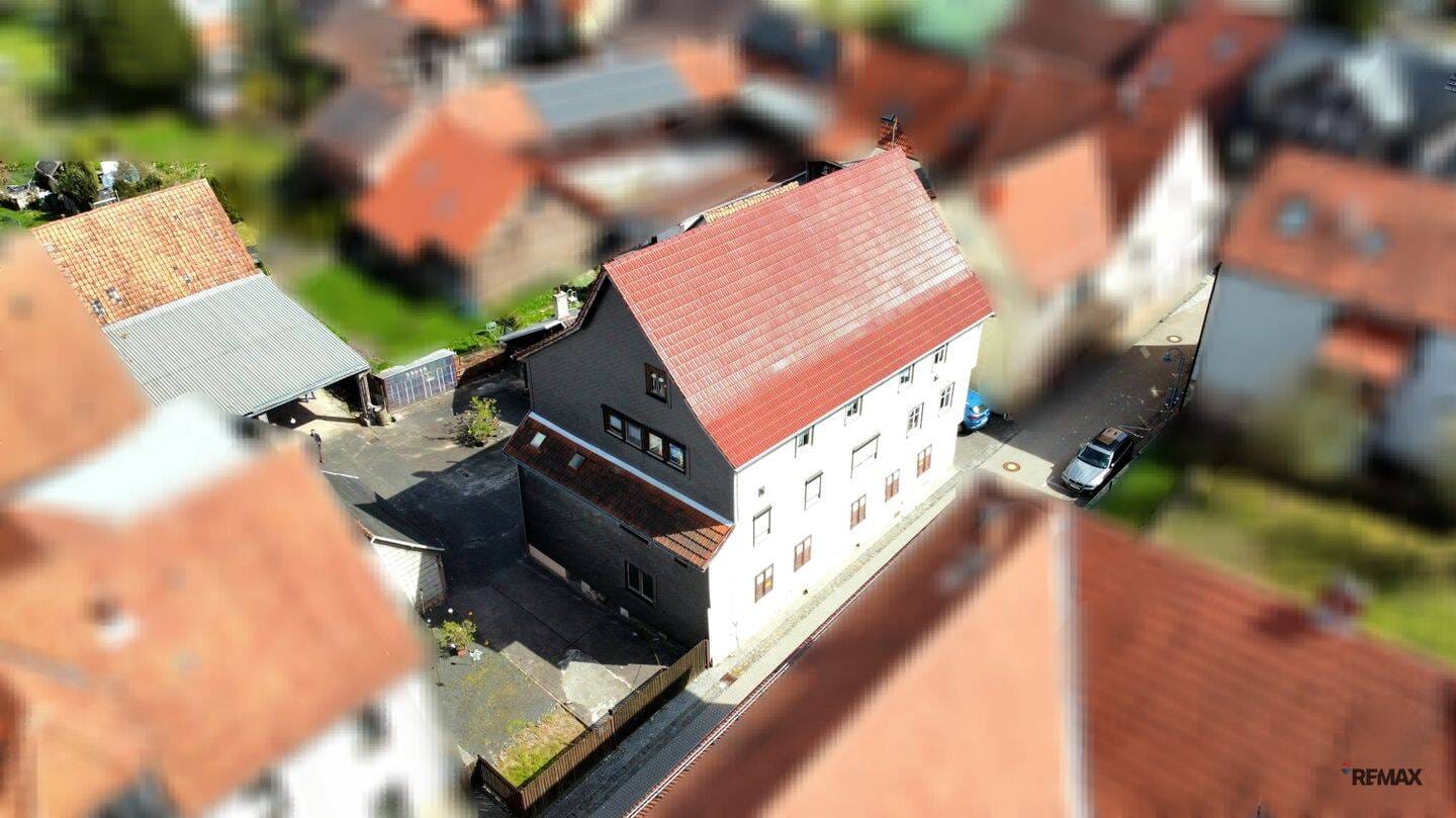 Immobilie in Schalkau - Historisches Mehrfamilienhaus- und Gewerbeobjekt mit großem Grundstück & Entwicklungspotenzial - Bild 2