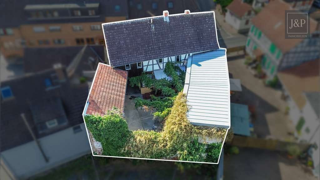 Immobilie in Bruchköbel - Zentral & vielseitig: Großes Fachwerkhaus mit Einliegerwohnung und Nebengebäuden! - Bild 4