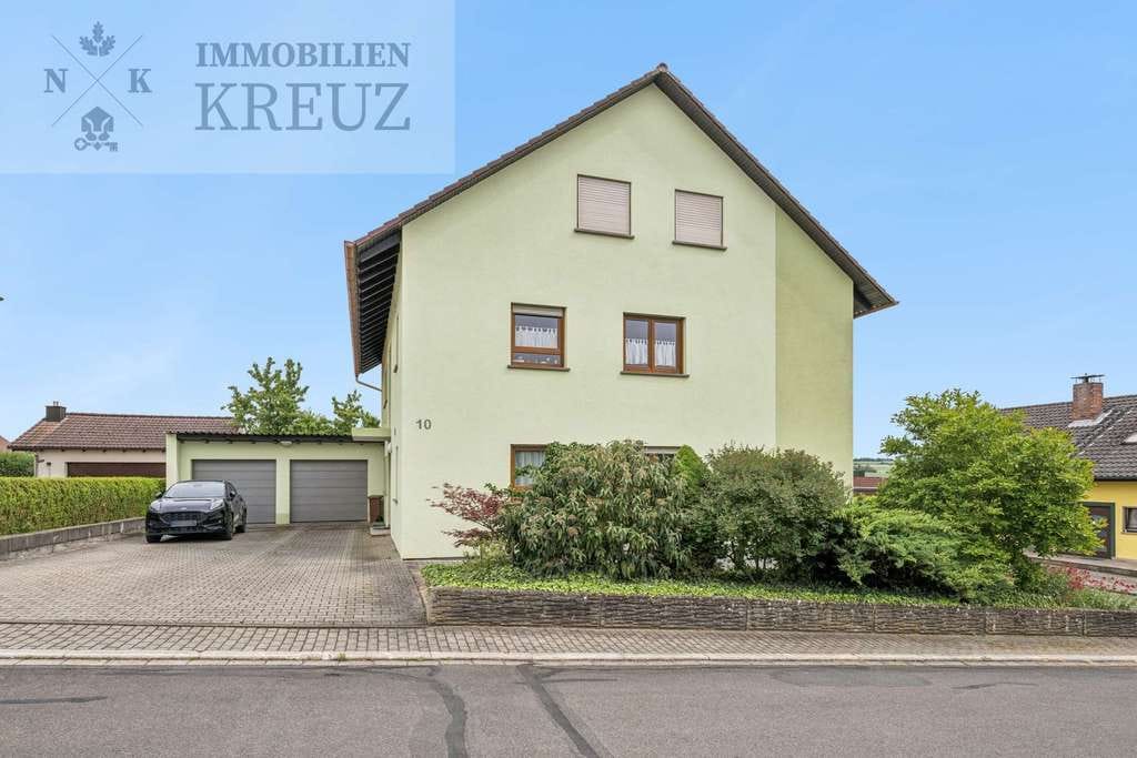Immobilie in Großrinderfeld - Kapitalanlage mit Entwicklungspotenzial | Zwei Wohneinheiten, Ausbaureserve und 750 m² Grundstück - Bild 1