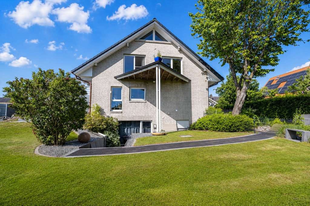 Immobilie in Langballig - Ringsberg: Einfamilienhaus mit Einliegerwohnung zum Ankommen, Durchatmen und Bleiben - Bild 4