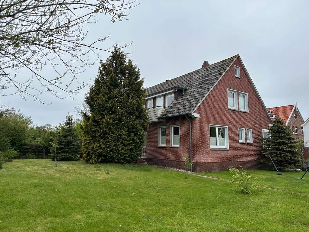 Immobilie in Langeoog - Interessantes freistehendes Einfamilienhaus mit zwei Wohnungen und einem Nebengebäude - Bild 2