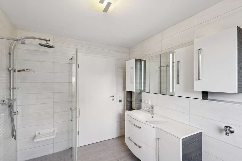 Immobilie in Petersdorf - Ihr Rückzugsort im Grünen: Wohnung mit Kamin, Garage und Garten - Bild 1