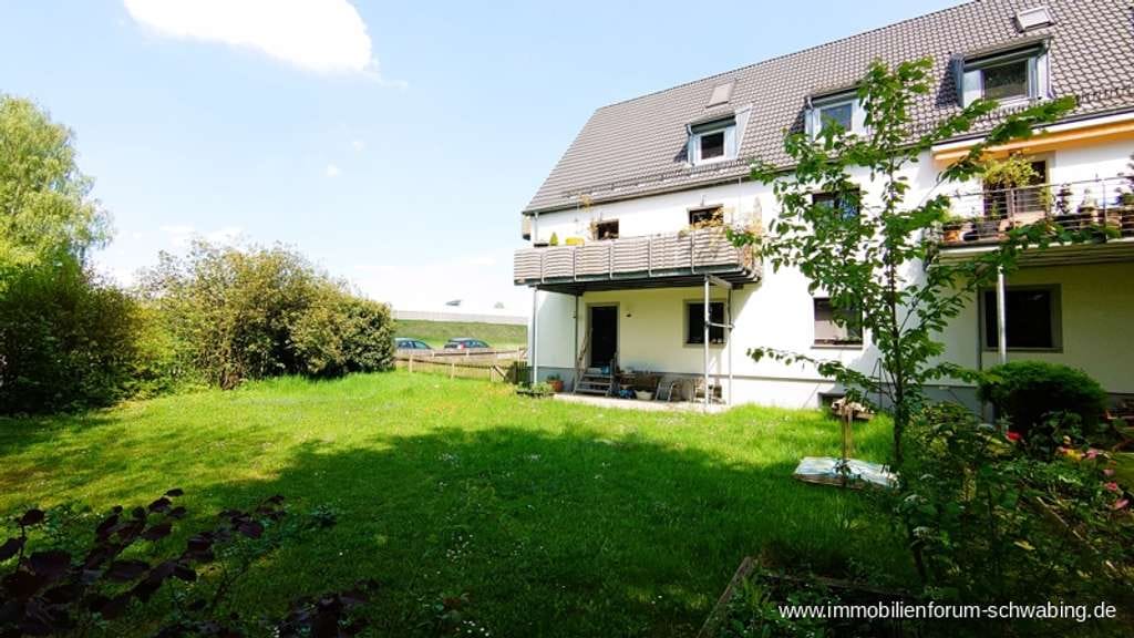 Immobilie in Unterföhring - Familiengerechte 3-Zimmer-Wohnung mit Terrasse und großem Gartenanteil in Unterföhring! - Bild 1