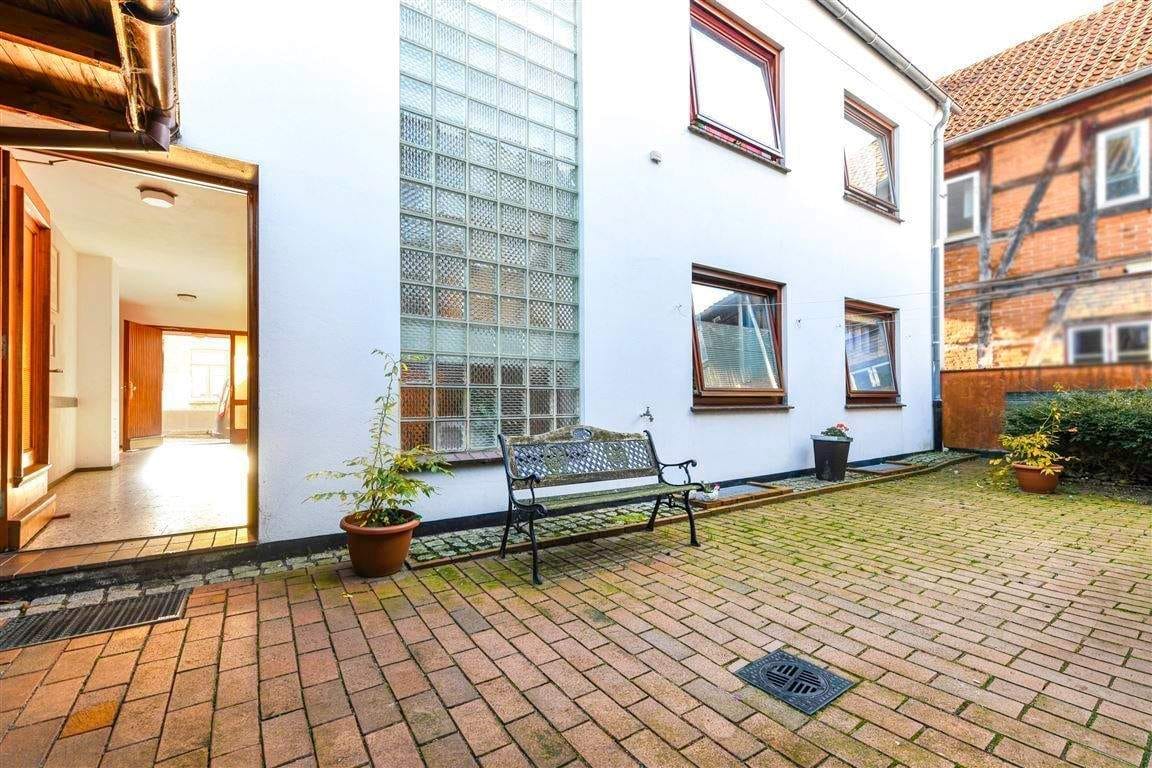 Immobilie in Neustadt in Holstein - 2 in 1 - Mehrfamilienhaus mit  EFH im Hinterhof - Bild 1