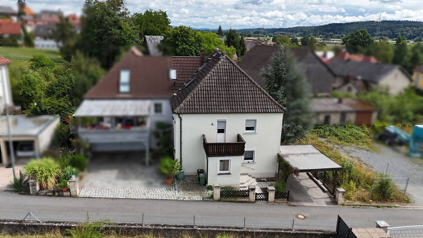 Immobilie in Burgkunstadt - Idylle trifft Potenzial: Solides Wohnungspaket (ca. 154 m²) mit pflegeleichtem Garten & Freisitz in Burgkunstadt-Mainroth! - Bild 1