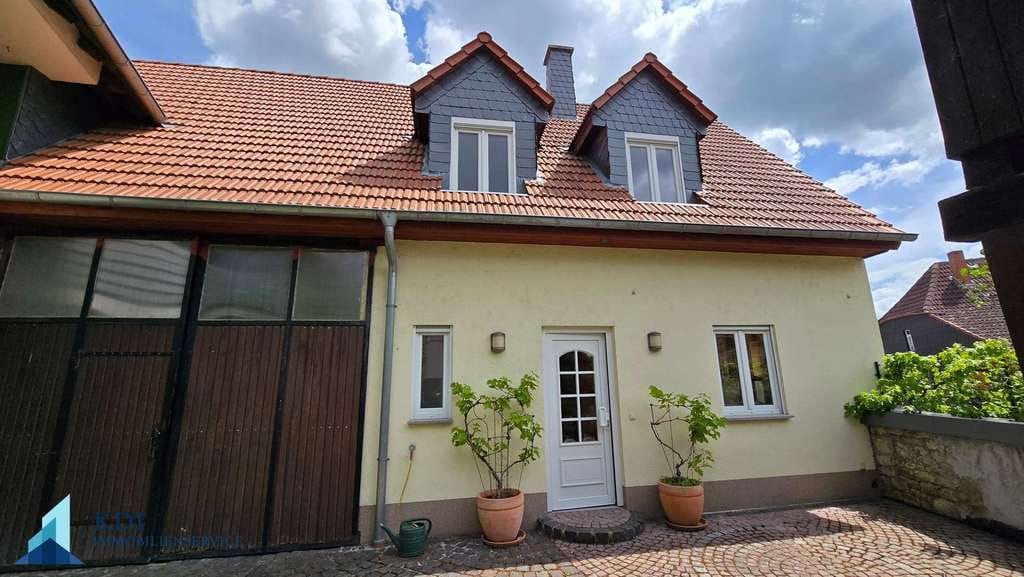 Immobilie in Stadecken-Elsheim - Ein Objekt - zwei Häuser: Modernes Zuhause trifft Altbau mit Zukunftspotenzial - Bild 2