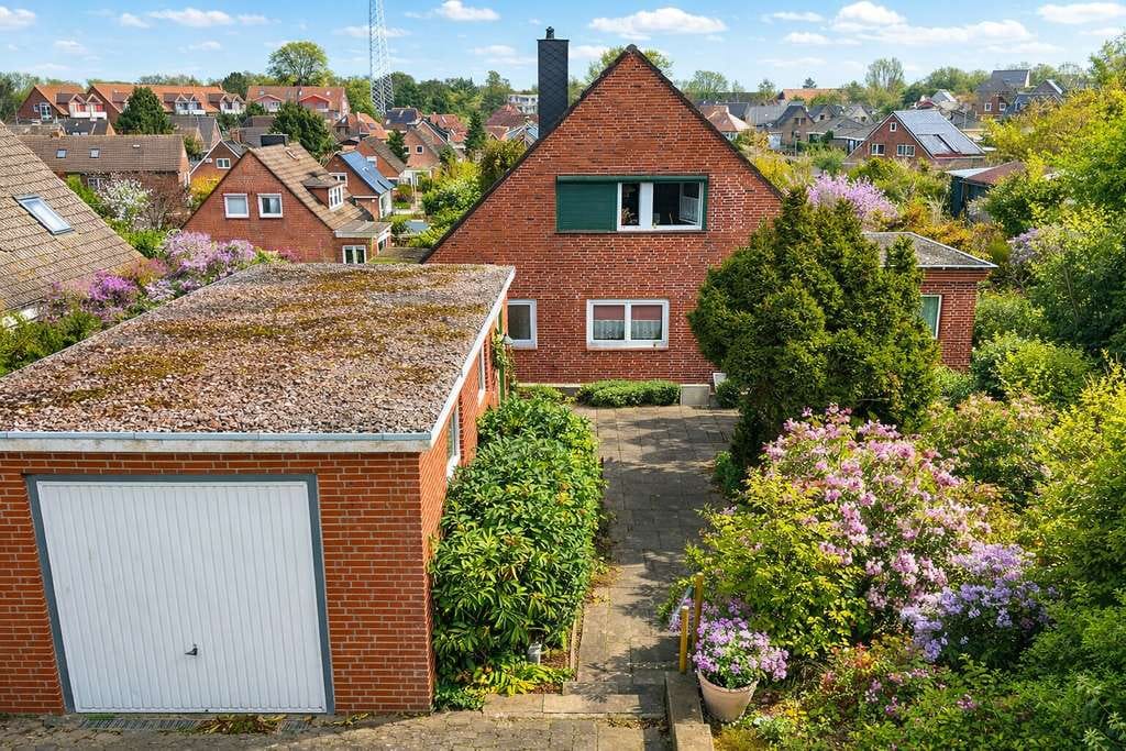 Immobilie in Heiligenhafen - Vielseitiges Einfamilienhaus mit Einliegerwohnung - Bild 1