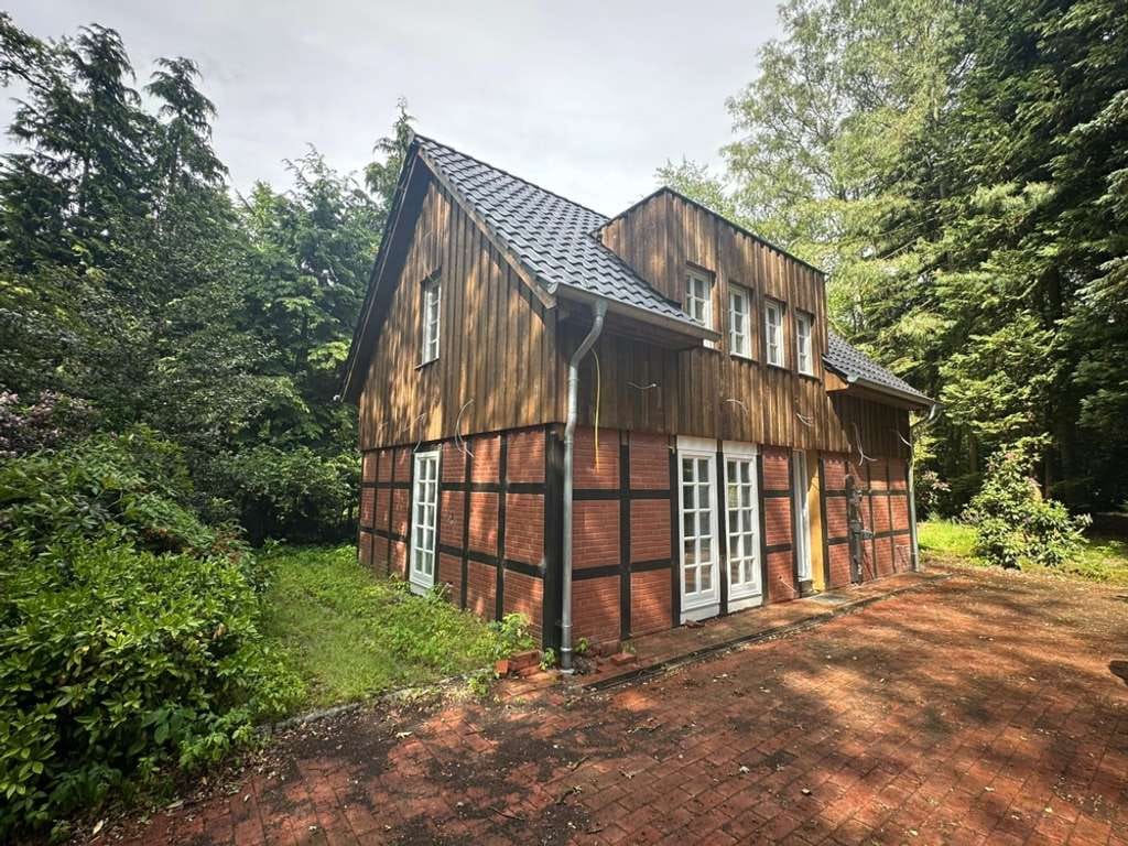 Immobilie in Dötlingen - ZWISCHEN BÄUMEN UND WEITE! Wochenendhaus in absolut ruhiger und naturnaher Wohnlage! Waldgrundstück! - Bild 0
