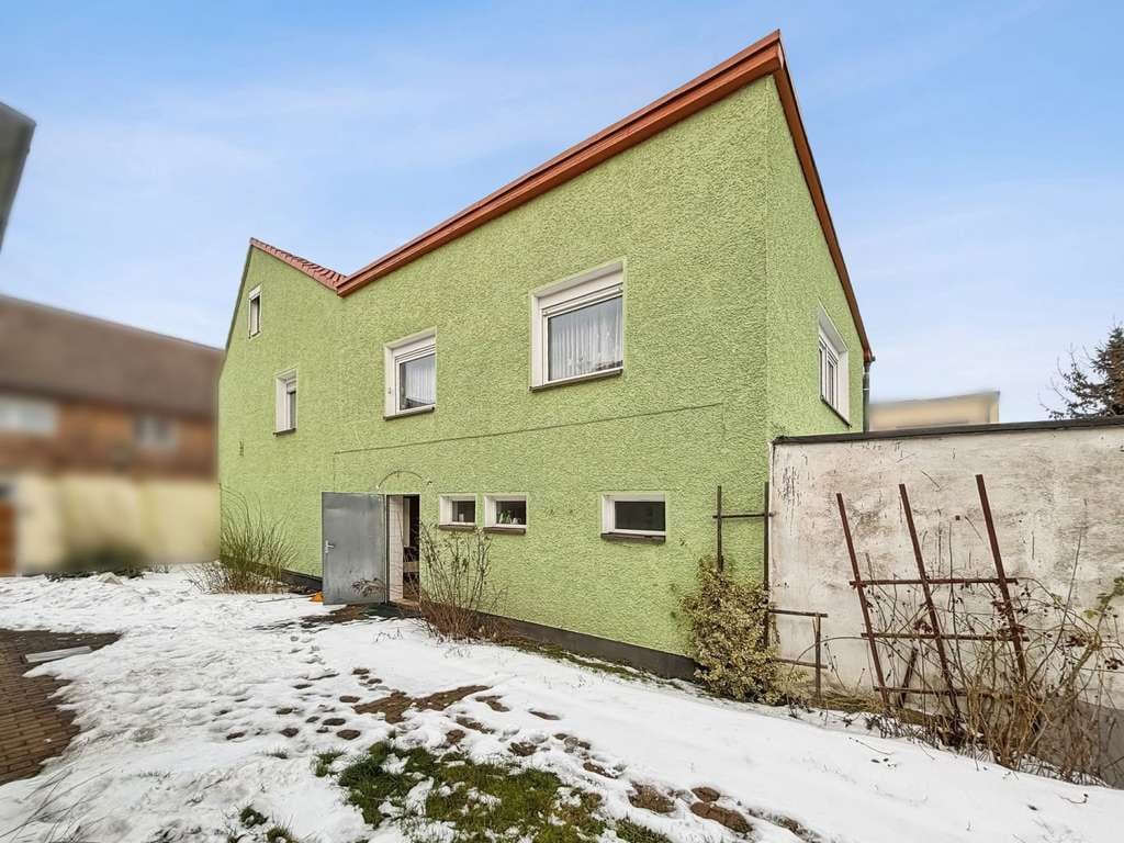 Immobilie in Kabelsketal - Attraktives Zweifamilienhaus mit Potenzial für junge Familien zum Wohlfühlen in Kabelsketal - Bild 2