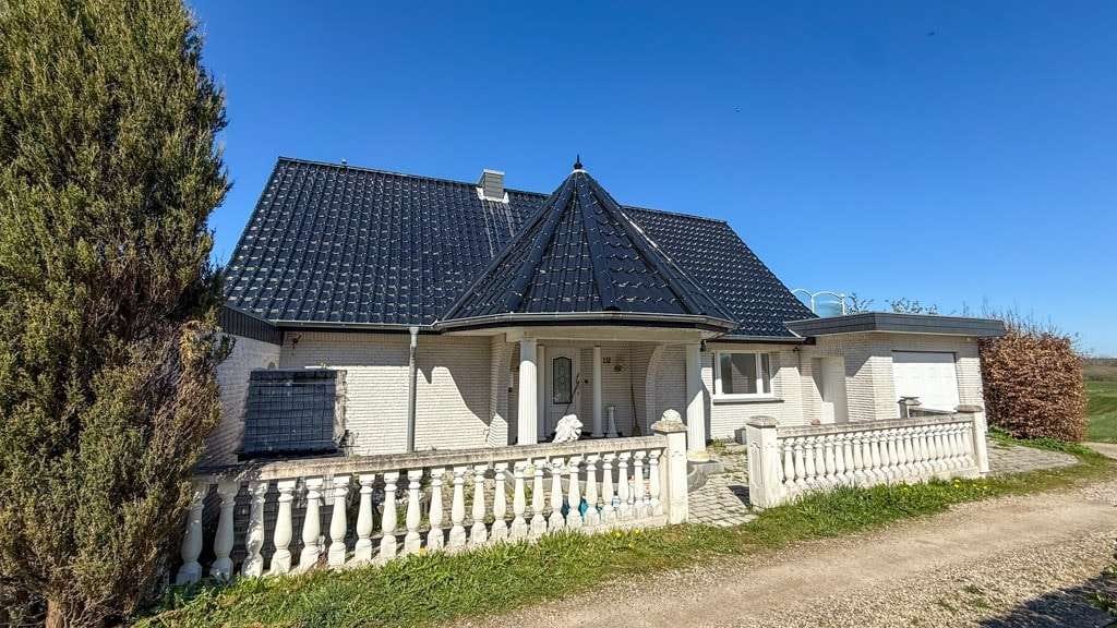 Immobilie in Mittelangeln - Wohnhaus mit südländischem Flair! Wohnhaus mit Doppelgarage, Wintergarten und Dachterrasse - Bild 2