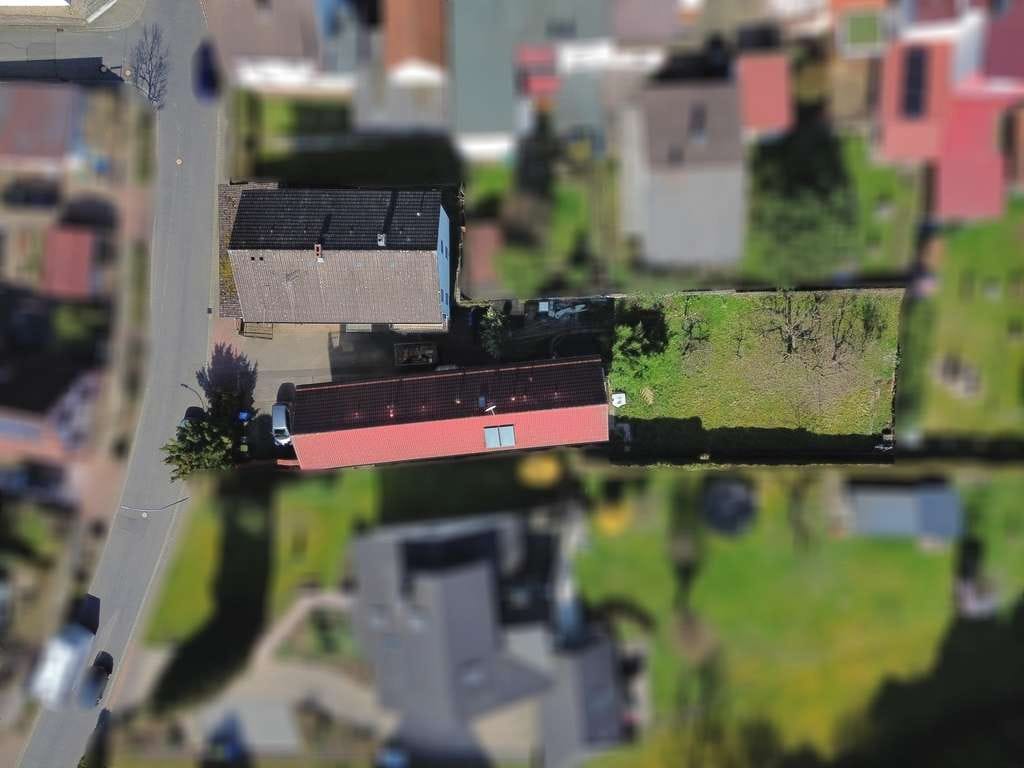 Immobilie in Gründau - Attraktives Gesamtensemble: 2 Häuser, 3 Wohnungen – ideal für Eigennutzer oder Kapitalanleger - Bild 2
