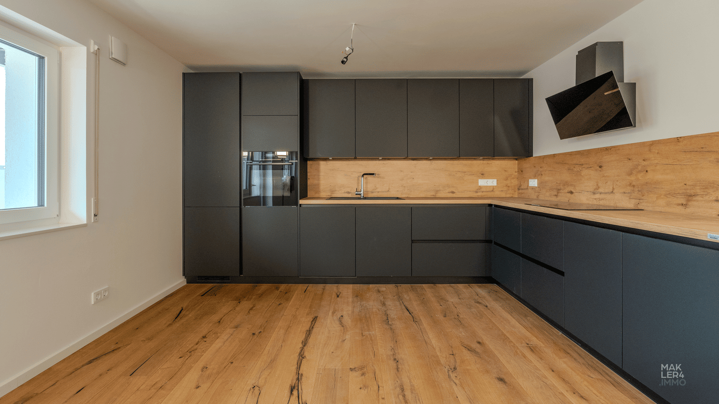 Immobilie in Poppenhausen - Sanierte 2-Zimmer-Wohnung mit Terrasse und Energieklasse A+ - Bild 1