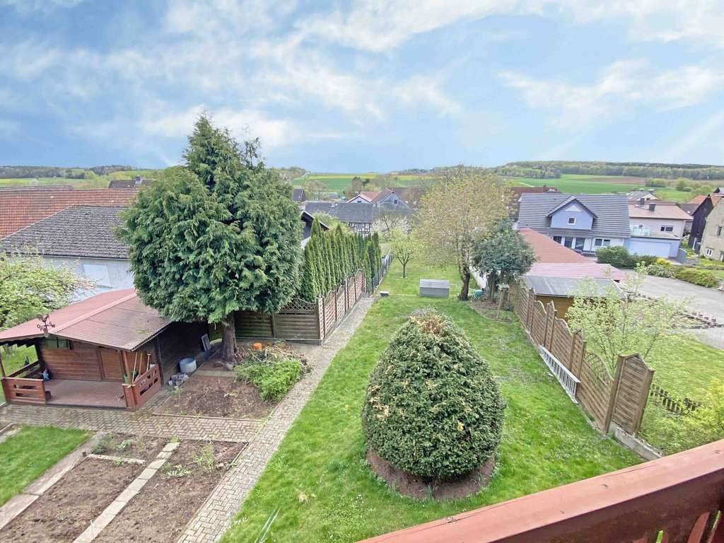 Immobilie in Mücke - Großzügiges Zweifamilienhaus mit Garten – ideal für Familien - Bild 2