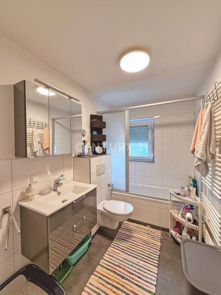 Immobilie in Ampfing - Zuhause mit XL-Potential: Modernisierte Wohnung + DG + Stellplatz - Bild 2