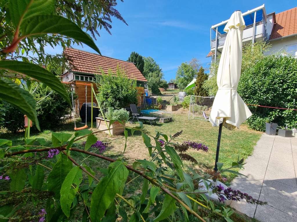 Immobilie in Schwaikheim - Wohnen mit Garten! Großzügige, helle 4-Zimmer Gartengeschoss-Wohnung in Schwaikheim - Bild 1