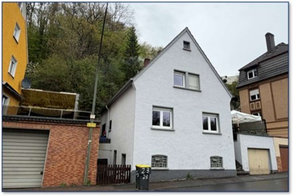 Immobilie in Iserlohn - Vermietetes Einfamilienhaus mit Garage und großem Garten in Iserlohn - Bild 0