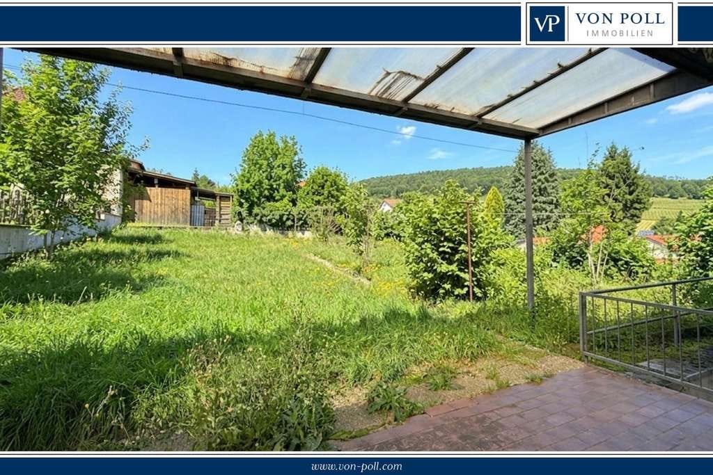 Immobilie in Schweigen-Rechtenbach - Wohnen mit Aussicht: Gut geschnittener Bungalow mit Garten und zwei Garagen - Bild 0
