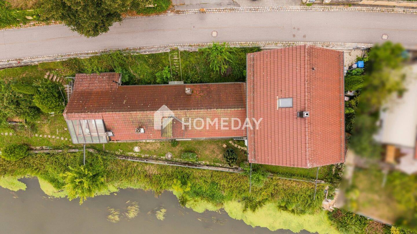 Immobilie in Vilshofen an der Donau - Vielseitiges Zweifamilienhaus mit Wintergarten und Garten - Bild 1
