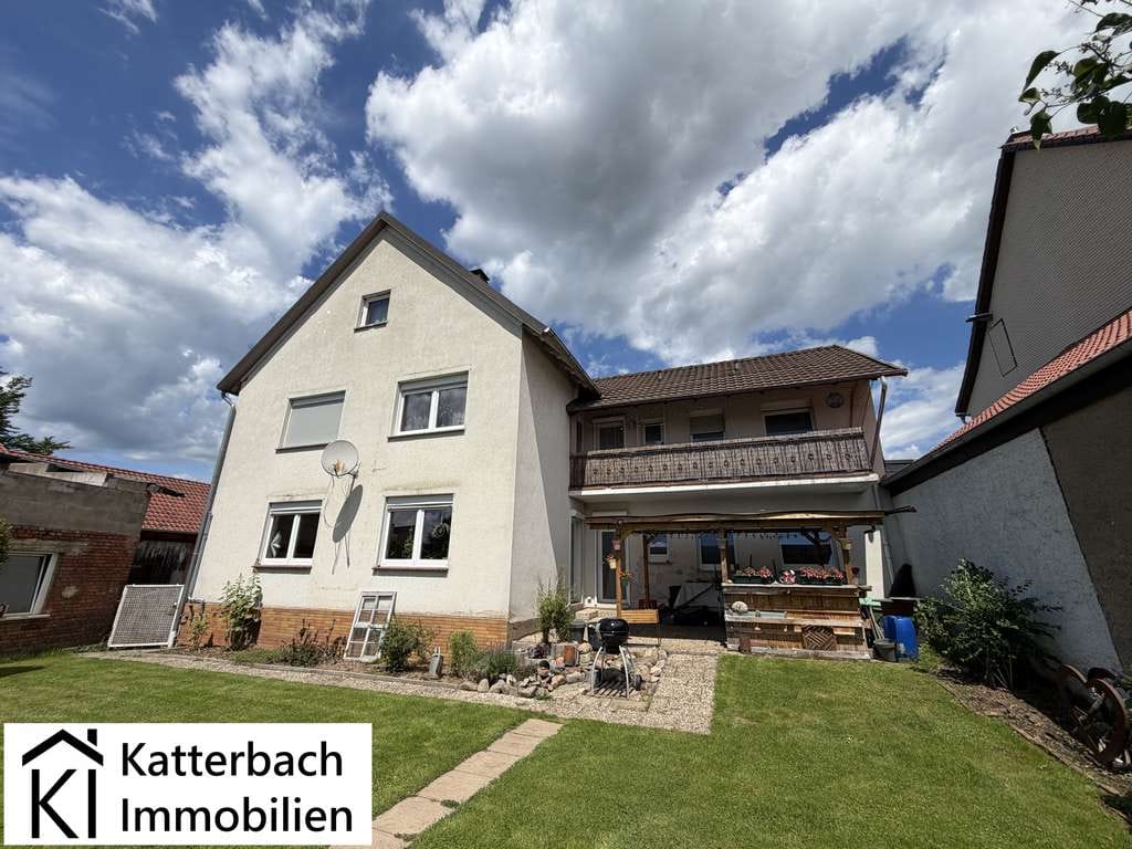 Immobilie in Wulften am Harz - Gepflegtes Zweifamilienhaus mit großem Werkstattgebäude und schönem Grundstück in Wulften - Bild 1