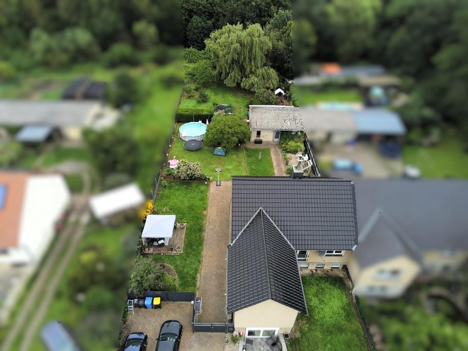 Immobilie in Osterburg (Altmark) - Charmantes Zweifamilienhaus mit Garten und Nebengelass - Bild 0