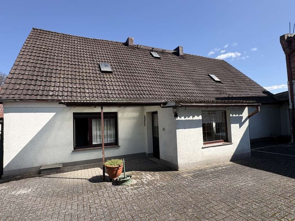 Immobilie in Gartz (Oder) - Renovierungsbedürftiges Einfamilienhaus mit Nebengelass in Hohenreinkendorf bei Gartz (Oder) ! - Bild 1