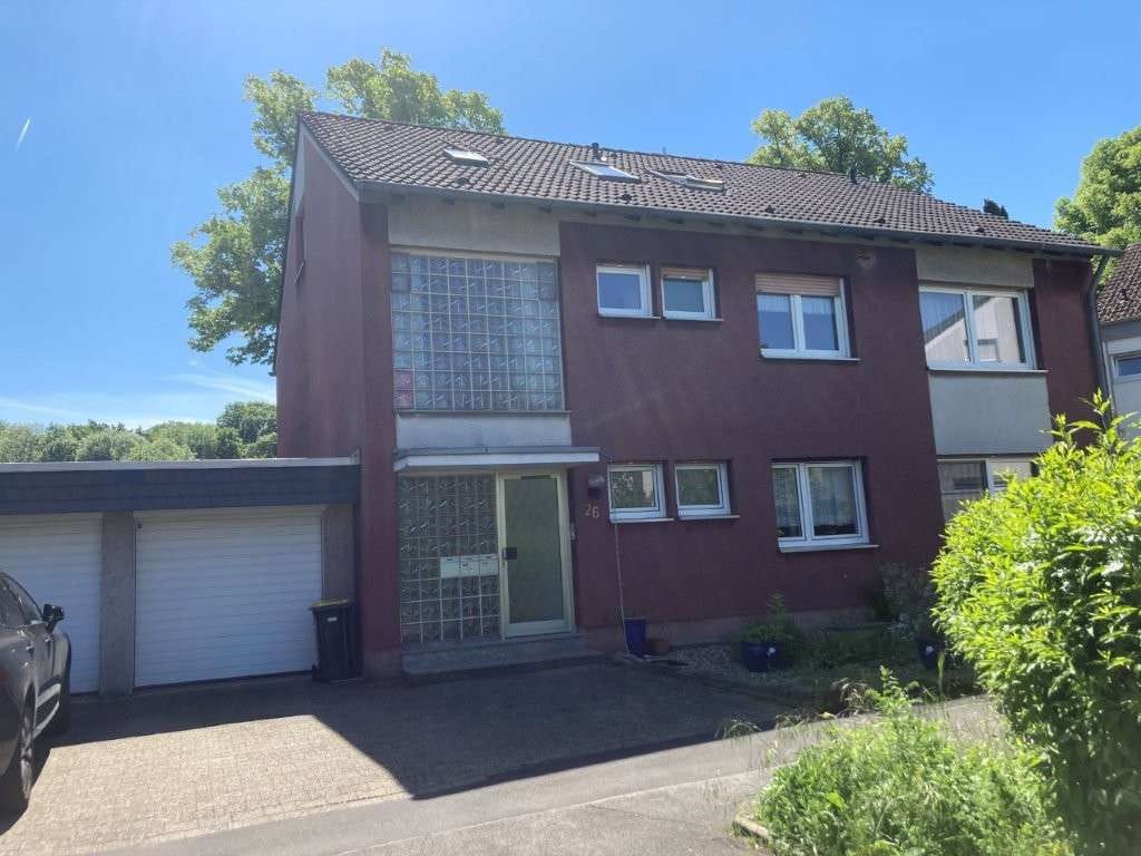 Immobilie in Holzwickede - Viel Platz für Ihre Pläne: Mehrfamilienhaus mit 3 WE in Holzwickede, 272 m² WFL, 98 m² KG - Bild 0