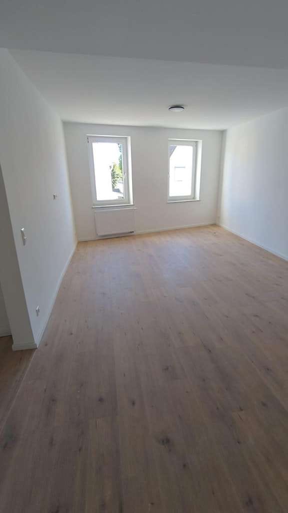 Immobilie in Bellheim - Kernsaniert & bezugsfertig - moderne 4-Zimmer-Wohnung mit Balkon in Bellheim - Bild 3