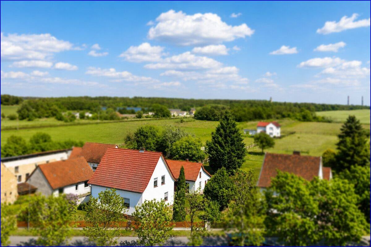 Immobilie in Plessa - Solides Einfamilienhaus mit großem Grundstück, Nebengelass und Potenzial - ruhige Randlage in Plessa - Bild 4