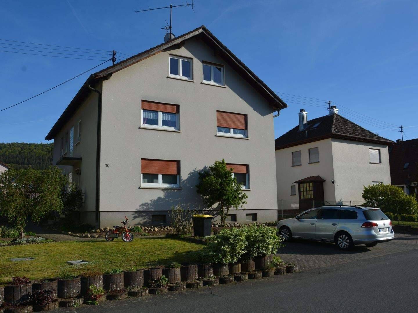 Immobilie in Wertheim - Geräumiges Mehrfamilienhaus mit Balkon und Garten in Mondfeld - Bild 1