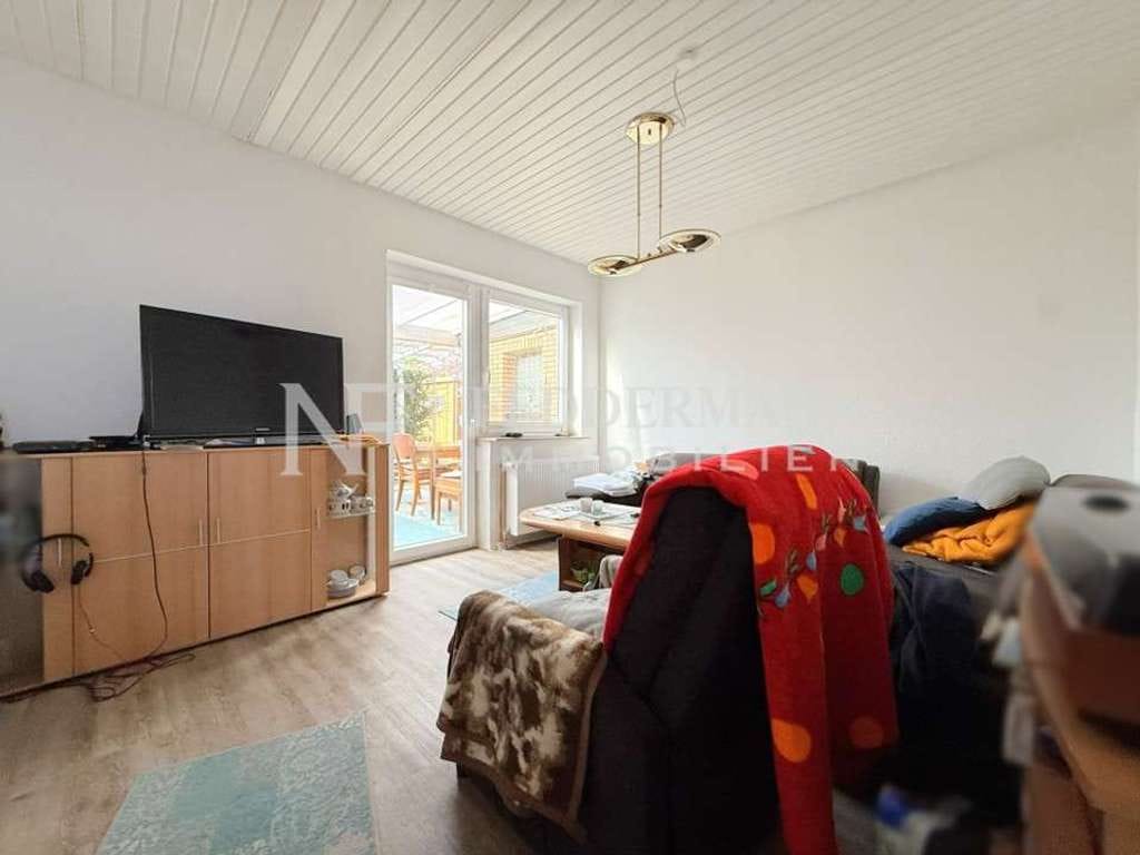 Immobilie in Hage - Ebenerdiges Reihenendhaus mit Garage in Hage! - Bild 1