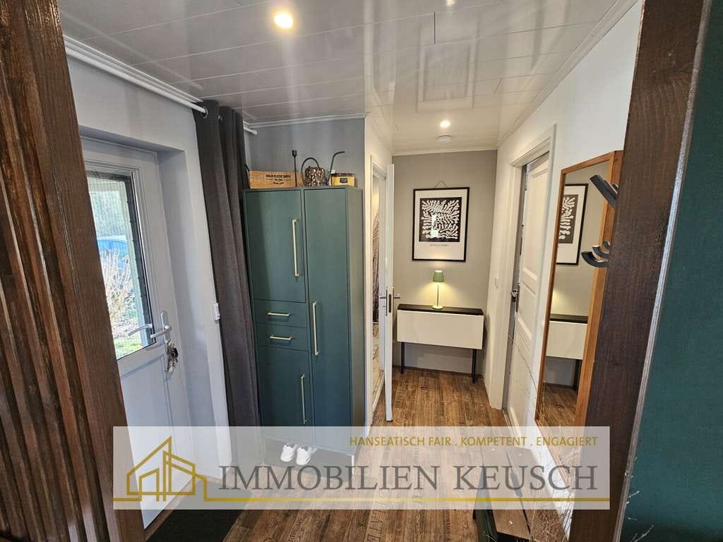 Immobilie in Vollersode - Traumhaftes und massiv gebautes Tiny House mit überdachter Terrasse & Schuppen in ruhiger Lage - Bild 1