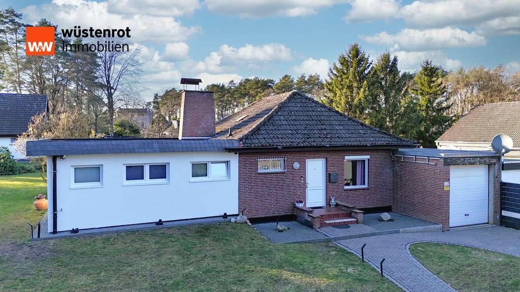 Immobilie in Ahausen - Bungalow mit 941 m² Grundstück, moderner Ausstattung und Garage - Bild 0