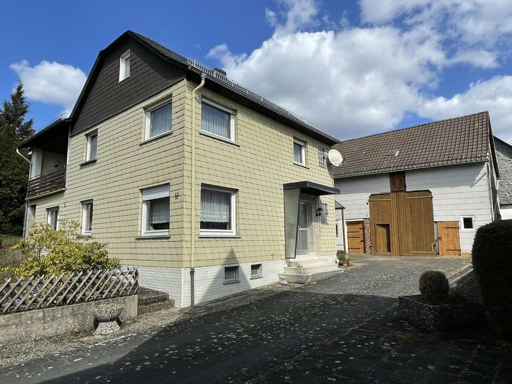 Immobilie in Hohenahr - 35644 Hohenahr-Mudersbach

Wohnhaus mit Nebengebäuden auf einem großartigem Grundstück - Bild 0