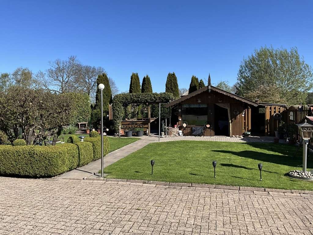 Immobilie in Stadland - Liebevoll gepflegtes Einfamilienhaus im Aussenbereich der Gem. Stadland - Bild 3