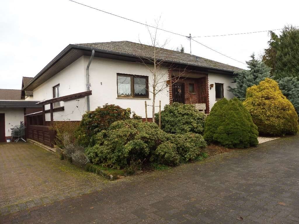 Immobilie in Dommershausen - Besser wohnen im Bungalow - 
Großzügigkeit auf einer Ebene mit zusätzlichem Wohnpotenzial - Bild 1