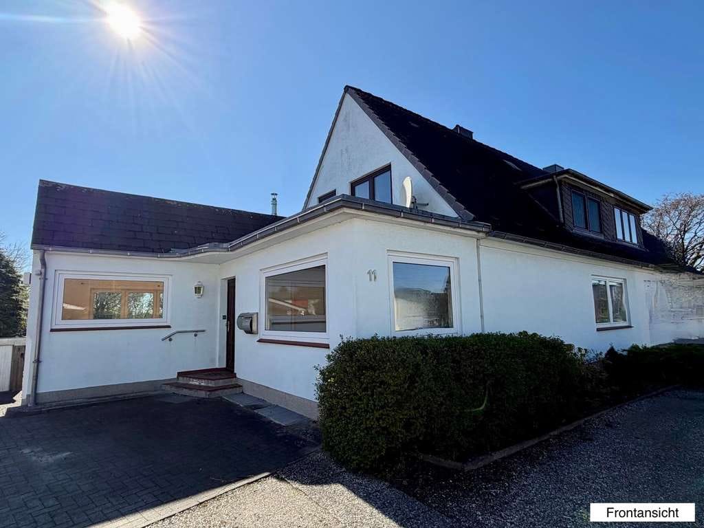 Immobilie in Sörup - Ein Zuhause voller Möglichkeiten, gepflegte DHH mit Einliegerwohnung in Sörup - Bild 0