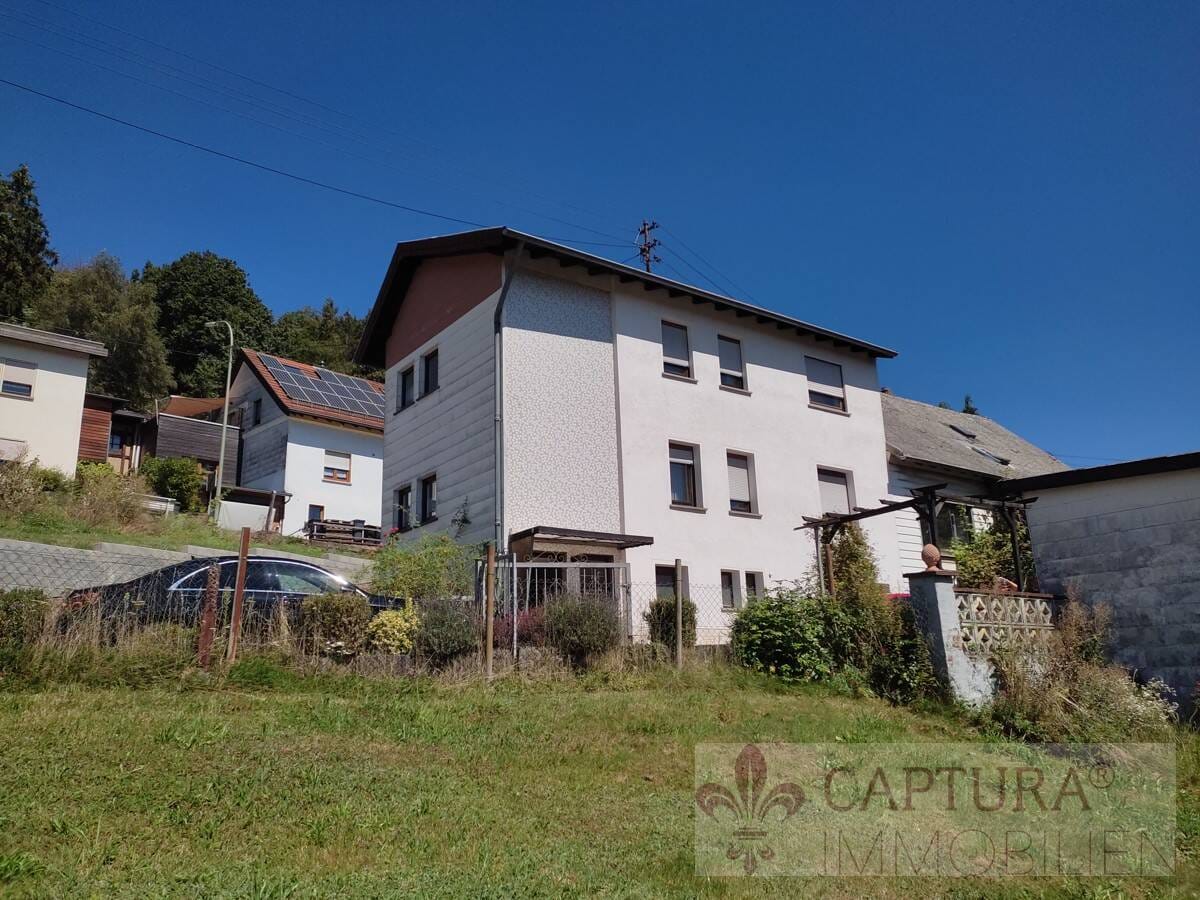 Immobilie in Eppelborn - Idyllisches Ein-Zweifamilienhaus mit Potenzial in ruhiger Lage von Eppelborn-Dirmingen! - Bild 0